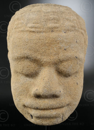 Ancient Khmer head KM83B. Angkor period, Cambodia.