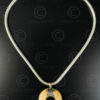 Ivory ring pendant on silver chain 616. India.