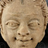 Indian statue C24. Stucco head of a cherub. South India.