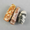 Three mottled calcite beads 22SH2. Oxus civilization, Central Asia. Second or first millenium BCE.