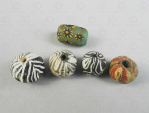 Five ancient glass paste beads 22SH8. Found in Afghanistan. Islamic period, circa 9th-12th century.