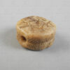 Engraved marble bead 22SH1B. Possibly Nuristan, Eastern Afghanistan. First millennium BC.
