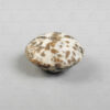 Mottled stone bead 22SH1E. Oxus civilization, Central Asia. Second or first millenium BCE.