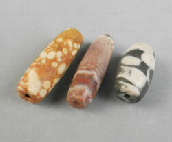 Three mottled calcite beads 22SH2. Oxus civilization, Central Asia. Second or first millenium BCE.