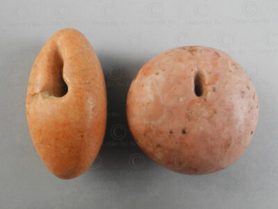 Two pink stone beads 22SH16. Oxus civilization, Central Asia. Second or first millenium BCE.