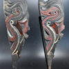 Pair of Batak singas ID151. Samosir Island, Sumatra, Indonesia.
